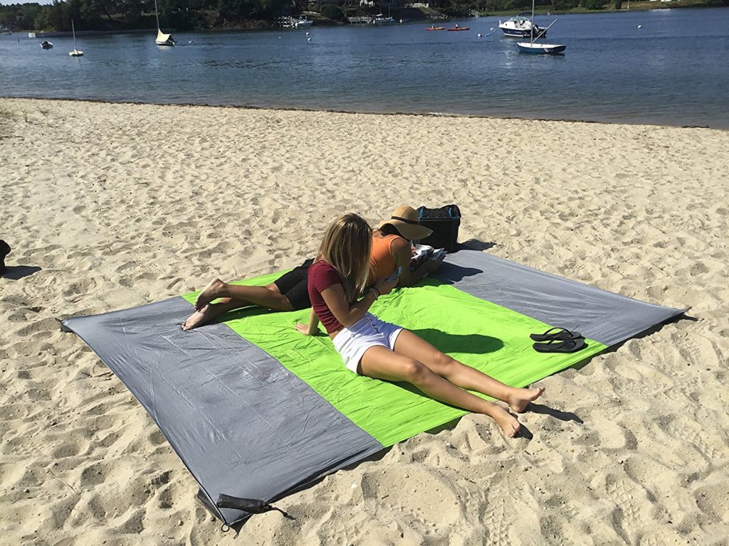 Couple Relaxing On The Oversized Streamline Blanket