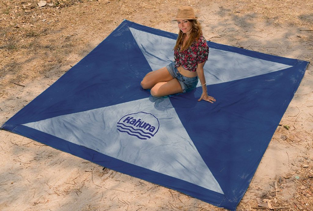 Woman Sitting On Kahuna Beach Blanket