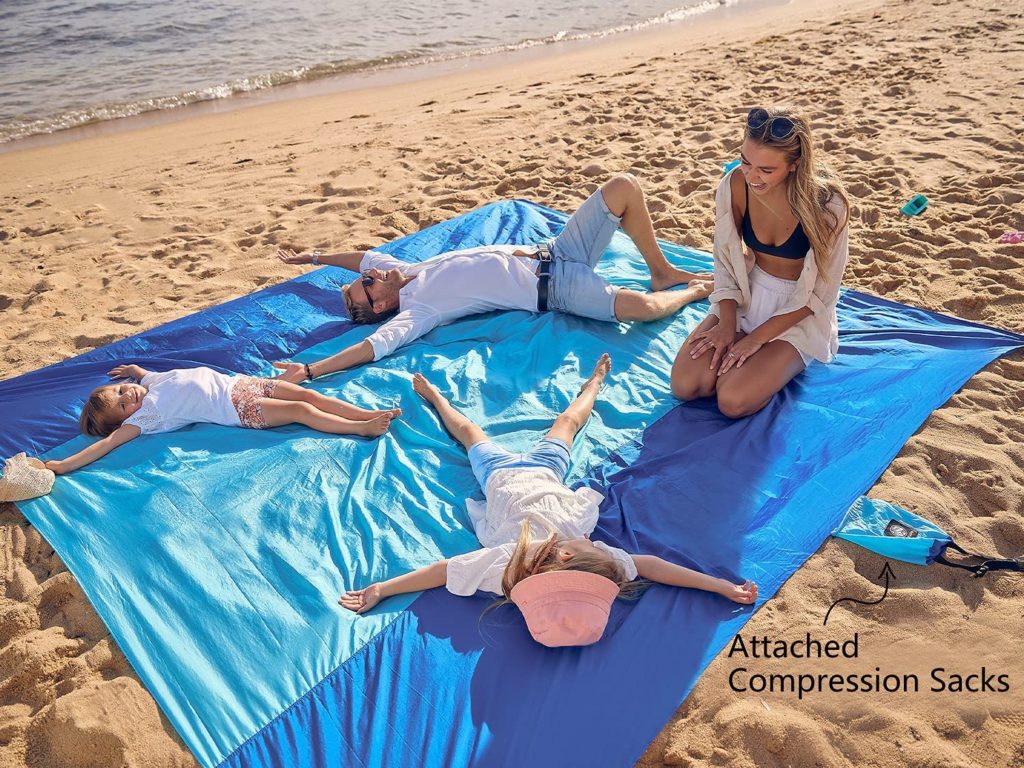 Family Relaxing on Wekapo Beach Blanket
