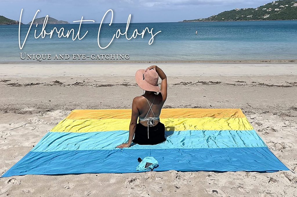 Woman Using The Oversized Bindle Eco-Beach Blanket